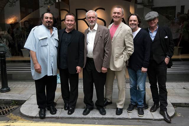 Jeremy Corbyn (C-L) poses with members of UB40 - (L-R) Norman Hassan, Robin Campbell, Duncan Campbell, Jimmy Brow