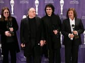 Ozzy Osbourne, Bill Ward, Tony Iommi and Terry Butler of  Black Sabbath" pose backstage during the 21st Annual Rock And Roll Hall Of Fame Induction Ceremony at the Waldorf Astoria March 13, 2006 in New York City. The induction ceremony will air March 21, 2006 on VH1.  (Photo by Scott Gries/Getty Images)