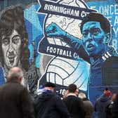 Fans visit a mural unveiling, featuring Bellingham and Birmingham legend Trevor Francis.