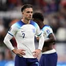 Jack Grealish of England looks dejected after their sides' elimination from the tournament during the FIFA World Cup Qatar 2022 quarter final match between England and France at Al Bayt Stadium on December 10, 2022 in Al Khor, Qatar. (Photo by Richard Heathcote/Getty Images)