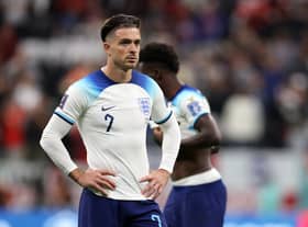 Jack Grealish of England looks dejected after their sides' elimination from the tournament during the FIFA World Cup Qatar 2022 quarter final match between England and France at Al Bayt Stadium on December 10, 2022 in Al Khor, Qatar. (Photo by Richard Heathcote/Getty Images)