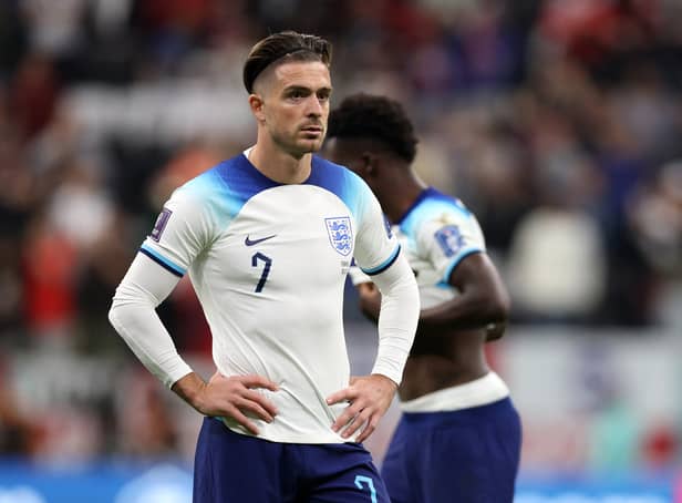 <p>Jack Grealish of England looks dejected after their sides' elimination from the tournament during the FIFA World Cup Qatar 2022 quarter final match between England and France at Al Bayt Stadium on December 10, 2022 in Al Khor, Qatar. (Photo by Richard Heathcote/Getty Images)</p>