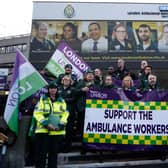 Christina McAnea, general secretary of UNISON, poses with ambulance workers at a picket line outside the Waterloo ambulance station in London on December 21, 2022. - Striking UK ambulance workers took to the picket lines, escalating a dispute with the government over its refusal to increase pay above inflation after recent walkouts by nurses. (Photo by Niklas HALLE’N / AFP) (Photo by NIKLAS HALLE’N/AFP via Getty Images)
