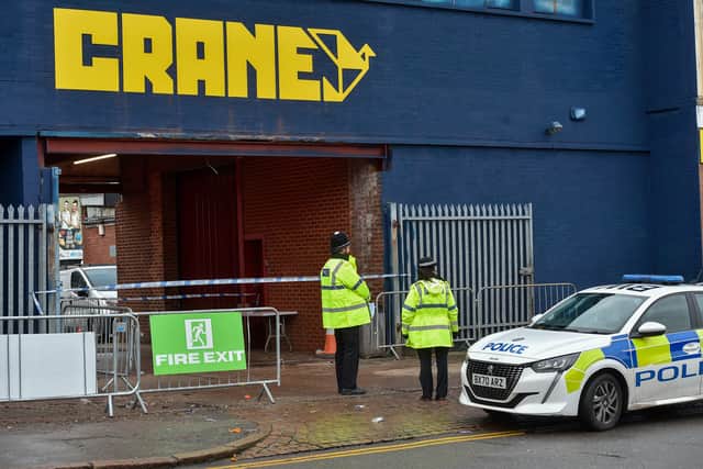 Police remain at the nightclub on Tuesday (27 December)