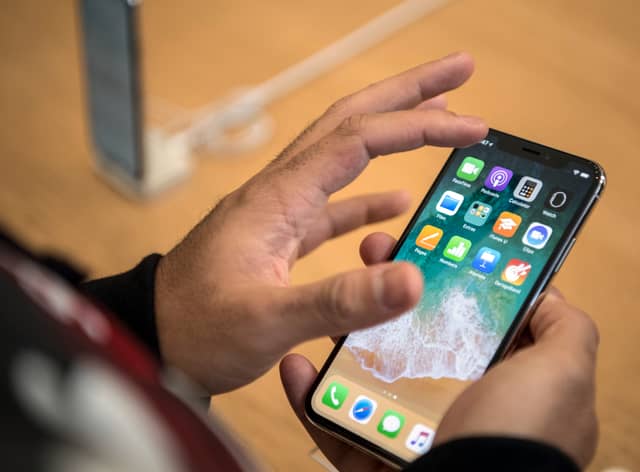 iPhone users could save hundreds of pounds using this clever trick (Photo by Carl Court/Getty Images).