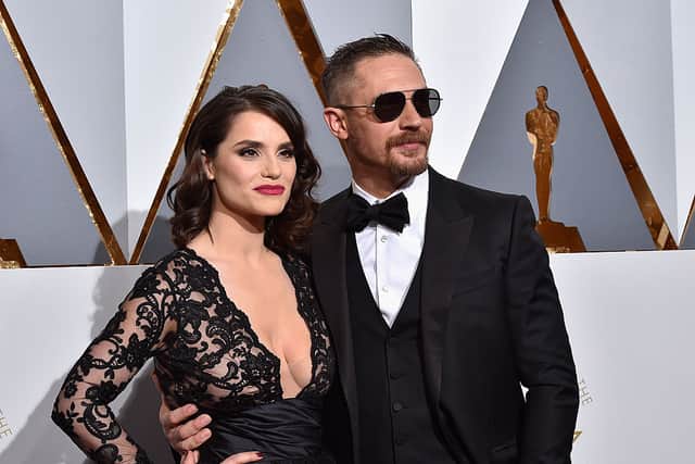 Actors Tom Hardy (R) and Charlotte Riley  (Photo by Kevork Djansezian/Getty Images)