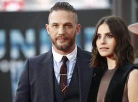 Tom Hardy and his wife Charlotte Riley (Photo credit - TOLGA AKMEN/AFP via Getty Images)