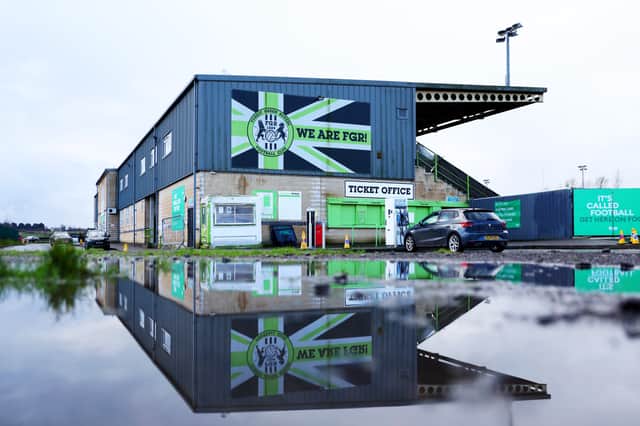 There was a lot of standing water inside and outside the ground at Forest Green Rovers after heavy rainfall.