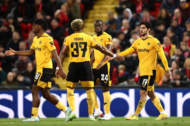 Goncalo Guedes celebrates scoring Wolves' first goal against Liverpool