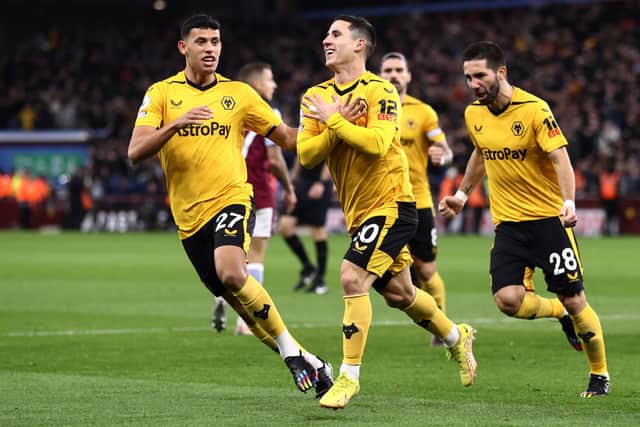 Daniel Podence of Wolverhampton Wanderers celebrates with teammates (Photo by Naomi Baker/Getty Images)