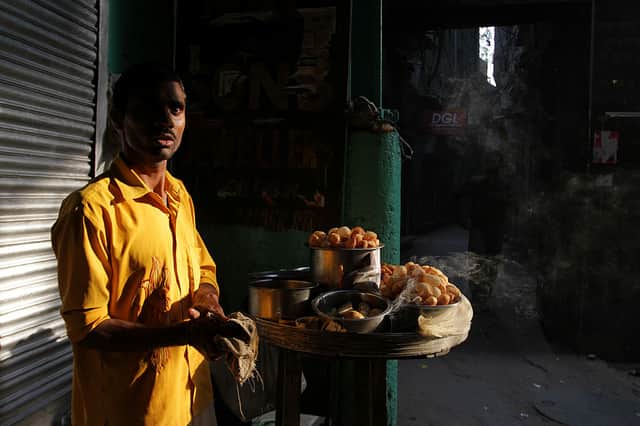 A street vendor prepares food in Chandni Chowk market in the streets of Old Delhi  (Photo by Dan Istitene/Getty Images)