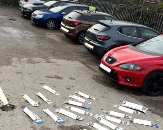 Stolen cars and number plates (Photo - West Midlands Police)