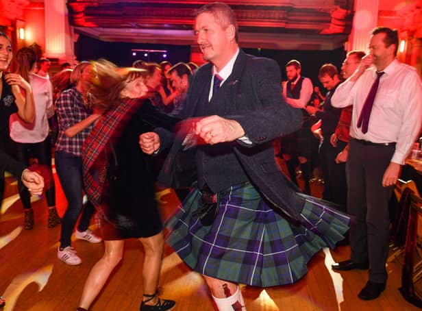 <p>People ceilidh dance during the Burns & Beyond traditional Burns Supper (Photo by Jeff J Mitchell/Getty Images)</p>