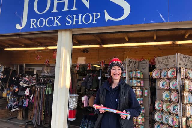 Victoria with Weston-super-Mare sticks of rock on sale at John’s Rock Shop on the seafront