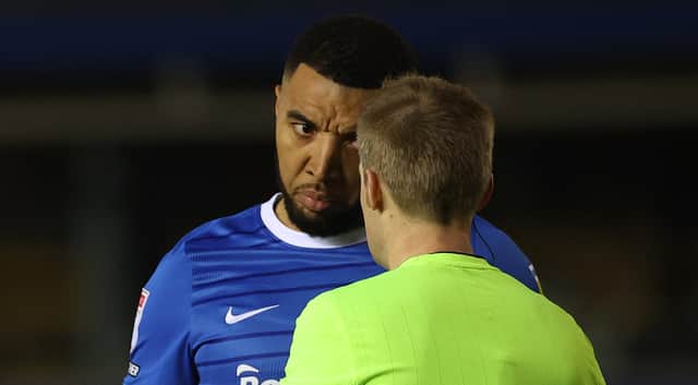 Troy Deeney of Birmingham City talks to referee Gavin Ward during the Sky Bet Championship between Birmingham City and Cardiff City