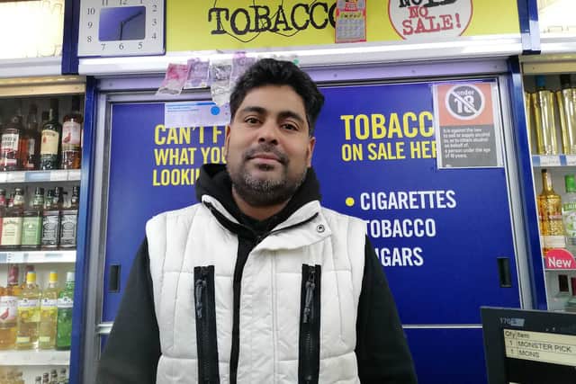 Mr Vasathamohan Arulsamy, 41, behind the counter at the Lifestyle Express shop on Nechells Park Road.