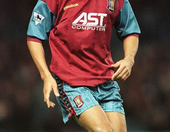 Paul McGrath in action for Aston Villa against Manchester City in the Premier League match at Maine Road in 1995