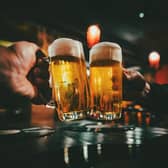 Pints at the bar. Picture: Adobe Stock
