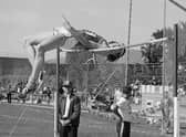 Dick Fosbury of the USA clears the bar in the high jump event at the AAAU Championships, Oregon, USA - Credit: Getty Images
