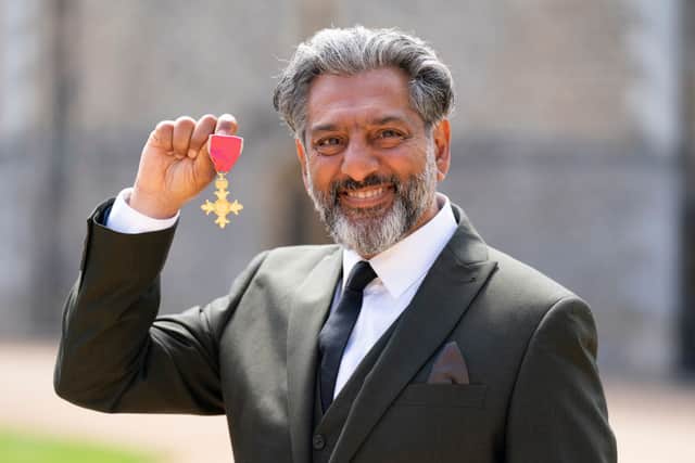Actor, Nitin Ganatra with his OBE, awarded by the Duke of Cambridge, after an investiture ceremony at Windsor Castle on May 17, 2022 in Windsor, England. (Photo by Kirsty O'Connor - Pool / Getty Images)