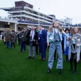 Emotions on show as owners watch their horse on the big screen from the parade ring during day three of the Cheltenham Festival 2023 at Cheltenham Racecourse on March 16, 2023 in Cheltenham, England. (Photo by Alan Crowhurst/Getty Images)