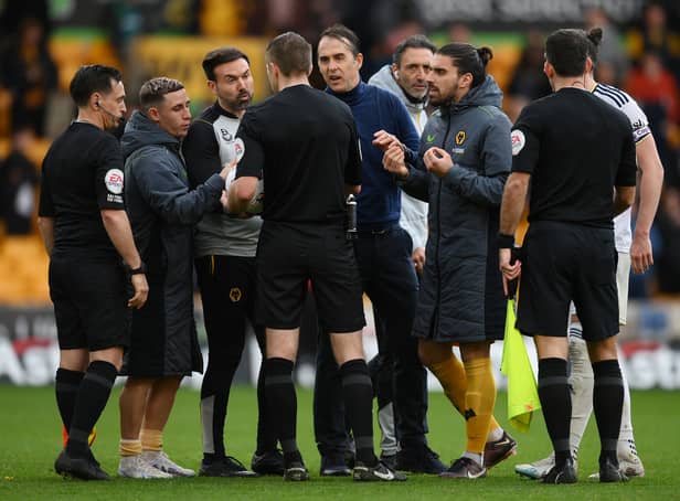 Julen Lopetegui, Manager of Wolverhampton Wanderers and Ruben Neves clash with Referee Michael Salisbury after the team’s defeat in the Premier League match between Wolverhampton Wanderers and Leeds United at Molineux 