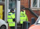 Police outside Dudley Road Mosque in Birmingham on March 21, 2023, where a man was attending before he was set alight