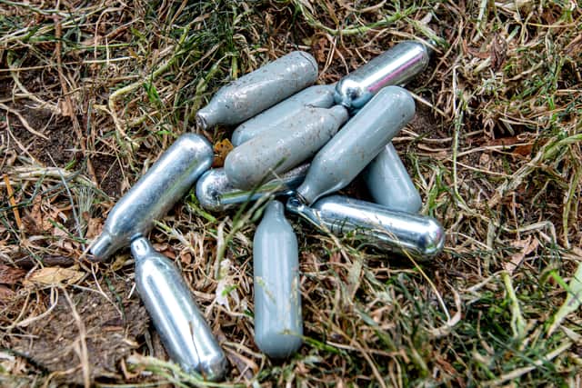 Discarded nitrous oxide (laughing gas) canisters which are commonly found in parks and areas where young people hang out