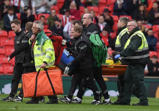 Dike was stretchered off at Stoke City.