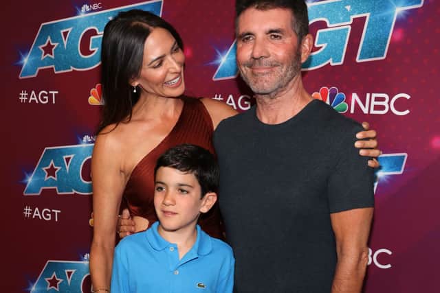 (L-R) Lauren Silverman, Eric Cowell and Simon Cowell (Photo by David Livingston/Getty Images)