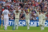 Australia's Usman Khawaja (2L), Australia's Steve Smith (C), Australia's wicket keeper Alex Carey (2R) and Australia's David Warner (R) appeal for an edge without success against England's Joe Root on day three of the first Ashes cricket Test match between England and Australia at Edgbaston in Birmingham