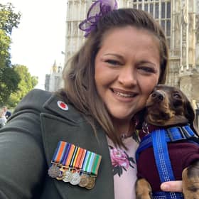 Martha with service daschund Daisy (Photo - Royal British Legion / SWNS)