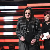 Ozzy Osbourne (L) and wife British television personality Sharon Osbourne  (Photo by Robyn Beck / AFP) (Photo by ROBYN BECK/AFP via Getty Images)