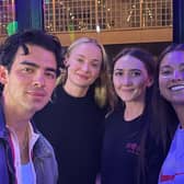 Joe Jonas and Sophie Turner with NQ64 arcade bar managers Rebecca Ridgway and  Erin Paterson in Digbeth 