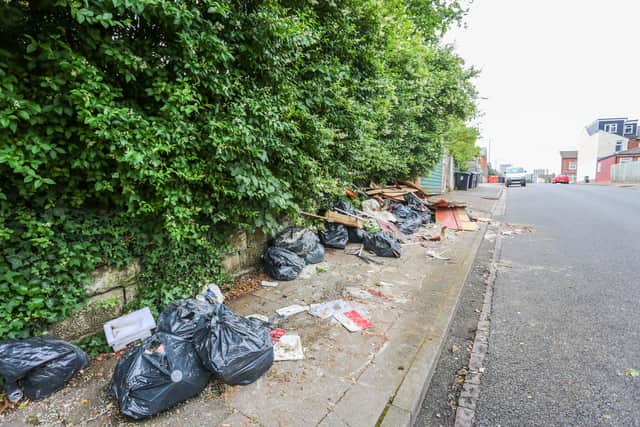 Litter and construction scatter the streets of Selly Oak, Birmingham