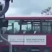 Video grab as a couple left onlookers stunned after they were filmed appearing to have sex on the top deck of a bus in Birmingham