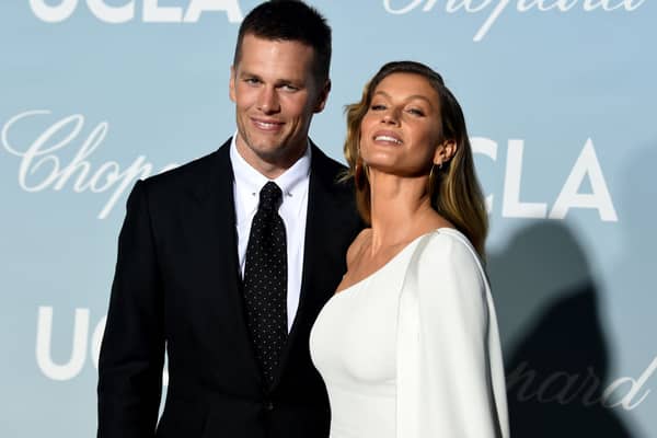  (L-R) Tom Brady and Gisele(Photo by Kevin Winter/Getty Images)