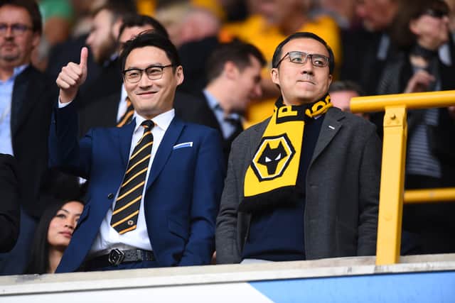 Wolves chairman Jeff Shi (R) recently penned an open letter to supporters about the FFP troubles.
