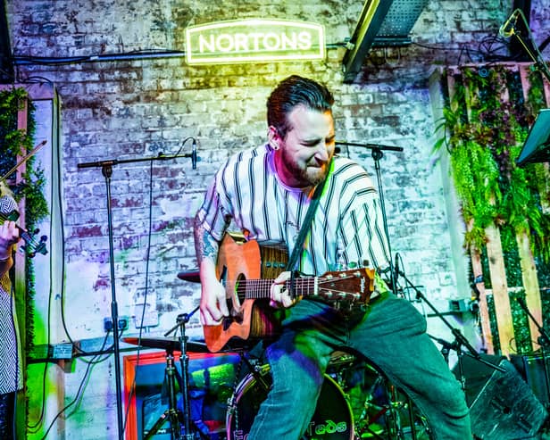 Eoin O'Brien performs on stage at Nortons Digbeth in Birmingham