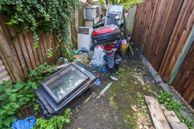 Claims of giant rats running riot inside peopleâs homes has led to desperate calls for an alleyway in Birmingham to be cleared once and for all. The huge mountain of rubbish - including around a dozen fridge-freezers, suitcases, battered old sofas and a rotting moped - has, according to locals, remained untouched for the last 10 years.  The grotty alleyway is between Bacchus Road and Nineveh Road in Handsworth and local landlord Kulvinder Raindi has now called on the council to do their bit and fine those responsible. 