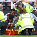 Tyrone Mings had to be stretchered off against Newcastle United. (Image: Getty Images) 