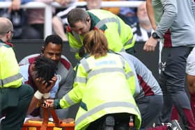 Tyrone Mings had to be stretchered off against Newcastle United. (Image: Getty Images) 