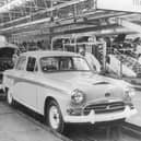 Austin A 95 cars are inspected at the end of the production line at the Austin Motor Company's Longbridge plant in Birmingham, August 1957. (Photo by Central Press/Hulton Archive/Getty Images)