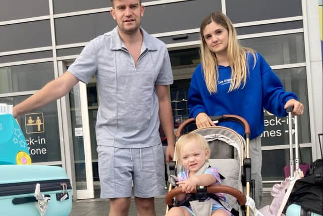 Nick and Gemma Furlong with their daughter from Leicester, arrive at Birmingham Airport from Gran Canaria, where their flight was delayed for around 7 hours. August 29th, 2023. 