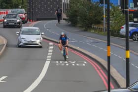 A cyclist using the road and bus lane whilst ignoring the cycling lane on the A34 in Birmingham on September 6, 2023. (Photo - Joseph Walshe / SWNS)