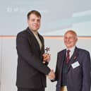 John Eastman, President IRTE and SOE (right) presents the award to Pawel Dudziec from National Express West Midlands