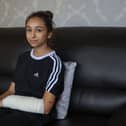Ana Paun with her arm bandaged after being attacked by the American XL Bully dog in Bordesley Green, Birmingham