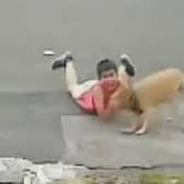 CCTV footage of Mohammed Sami Raza playing football in the street when he is attacked by a crazed dog