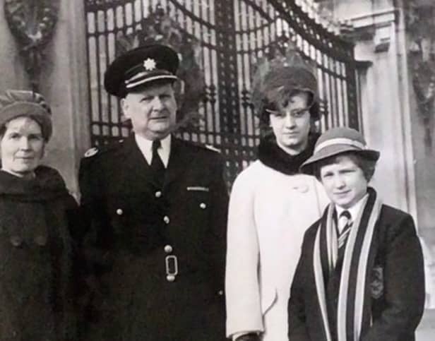 Birmingham fire officer George Goodman and family outside Buckingham Palace on October 26 1965