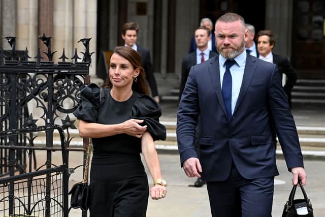 Coleen Rooney leaving court with Wayne Rooney in 2022 (Image: Getty Images)